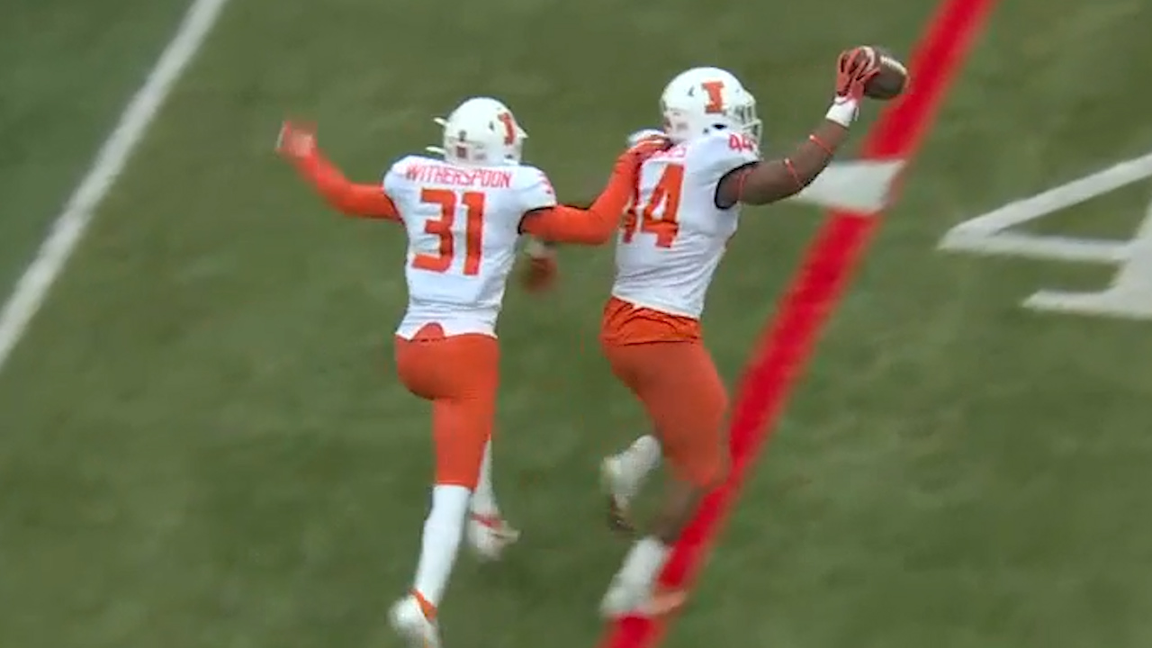 Illinois' Josh Imatorbhebhe scores a 28-yard TD after a costly Cornhuskers' interception, Fighting Illini leads, 21-7
